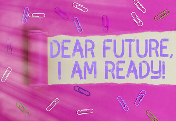 Conceptual hand writing showing Dear Future I Am Ready. Concept meaning Confident to move ahead or to face the future Rolled ripped torn cardboard above a wooden classic table