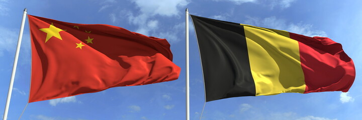 Waving flags of China and Belgium on flagpoles, 3d rendering