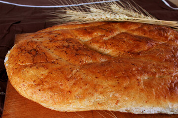 Fresh bakery. Fresh flavored bread and spikelets of wheat. Organic food. Ukrainian traditions.
