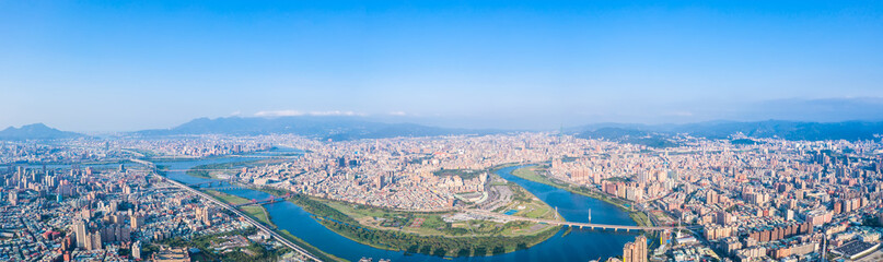 Taipei City Aerial View - Asia business concept image, panoramic modern cityscape building bird’s eye view under daytime and blue sky, shot in Taipei, Taiwan.