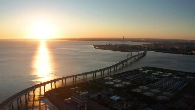 High-speed toll road, highway bypassing the city center St. Petersburg, the central section of the western high-speed section. A beautiful view of the sunset over the Gulf of Finland.