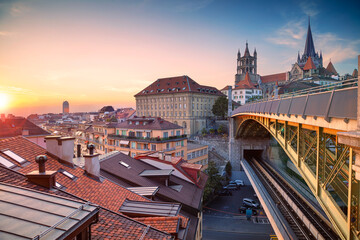 City of Lausanne. Cityscape image of downtown Lausanne, Switzerland during beautiful autumn sunset.	 - obrazy, fototapety, plakaty