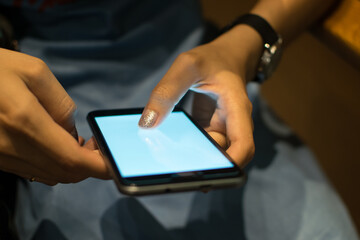 Working woman uses a smartphone with modern devices, digital.