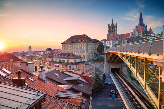 City of Lausanne. Cityscape image of downtown Lausanne, Switzerland during beautiful autumn sunset.	