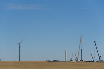 Fototapeta premium windmill construction on the prairies 
