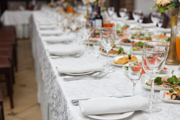 Table set for wedding or another catered event dinner.