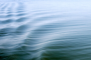 water moved by the movement of a boat