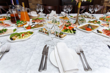 Table set for wedding or another catered event dinner.
