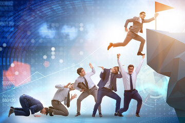 Career progression concept with businessman climbing stairs