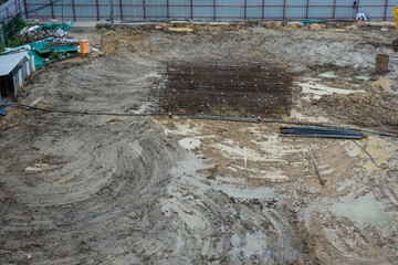 Preparation site and construction yard with mud and wet sand