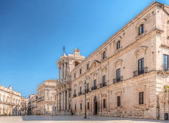 Fototapeta na wymiar Syracuse Sicily, cathedral square below in blue sky