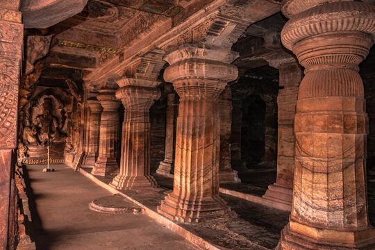 badami cave temple interior pillars stone art in details