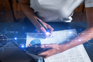 Technology drawings and a woman signing papers use phone. Double exposure.