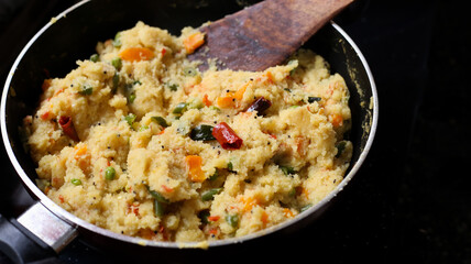 Preparing south indian breakfast, Rava upma recipes