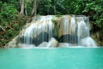 Erawan Waterfall, Karnchanaburi, Thailand, with water curtian and stream blue water pool