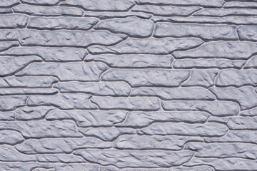 Silver color stone wall texture background. Material construction.