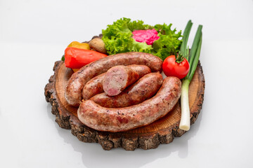 Home made sausage on a wooden board