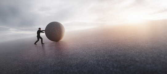 Businessman pushing heavy rock. © Photocreo Bednarek
