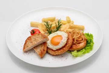 Beef rissole, juicy beef steak with egg and potatoes