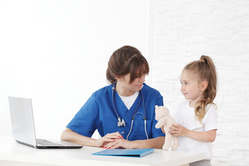 Young pediatrician and patient