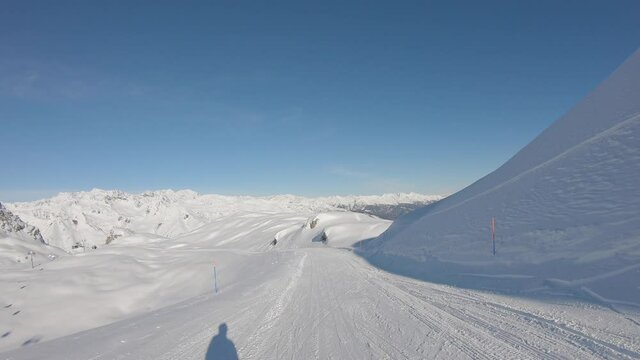 Tonale, Presena. Ski Helmet Point Of View. POV Downhill From The Ski Slopes At Presena Glacier. Alpine Skiing. Italian Alps