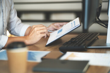 Businessman sitting in office working cooperation in solution.