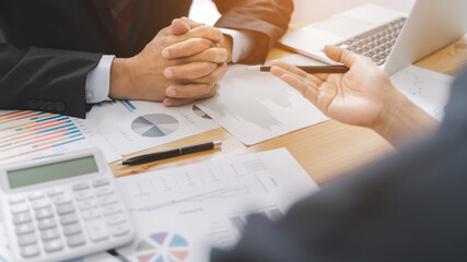 Business financial team meeting discussing performance in sales.