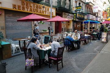 Fototapeta na wymiar Sept 19, 2020 Outdoor dining with social distancing after re-opening from from lockdown from Covid-19, New York City, USA.