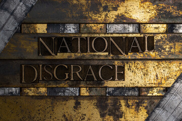 National Disgrace text message authentic on textured grunge copper and vintage gold background