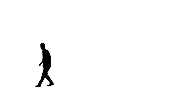 Silhouette Young man in white shirt doing back flip looking at camera and walking away.