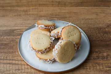 Alfajores: Traditional Peruvian cookies filled with caramelized milk and shredded coconut.
