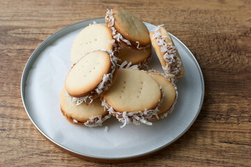 Alfajores: Traditional Peruvian cookies filled with caramelized milk and shredded coconut.
