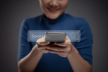 Asian woman using smart phone for searching with browser icon hologram effect.