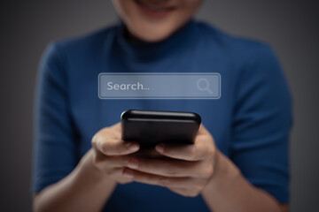 Asian woman using smart phone for searching with browser icon hologram effect.