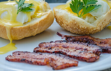 Homemade Benedict Eggs on the plate with souce