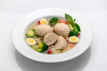 Hot chicken soup with vegetables,, broth with meatballs