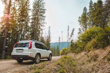 off road car travel by mountains peak autumn season