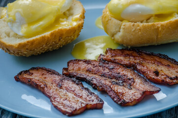 Homemade Benedict Eggs on the plate with souce