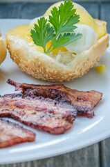 Homemade Benedict Eggs on the plate with souce