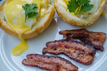 Homemade Benedict Eggs on the plate with souce