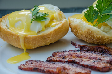Homemade Benedict Eggs on the plate with souce