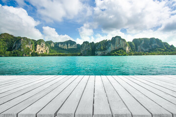 White wooden table top for product stand montage photo with Railay Beach in Krabi province image