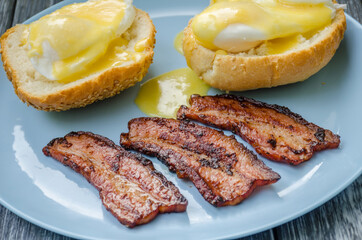 Homemade Benedict Eggs on the plate with souce