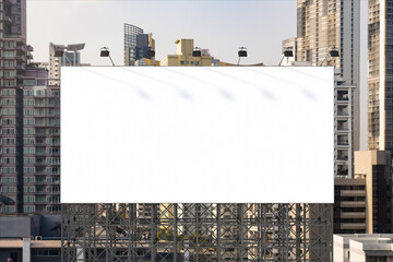 Obraz premium Blank white road billboard with Bangkok cityscape background at day time. Street advertising poster, mock up, 3D rendering. Front view. The concept of marketing communication to promote or sell idea.