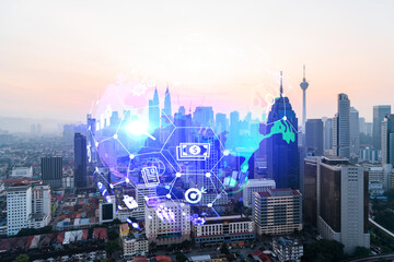 Hologram of Research glowing icons. Sunset panoramic city view of Kuala Lumpur. Concept of innovative technologies to create new services and products in Malaysia, Asia. Double exposure.