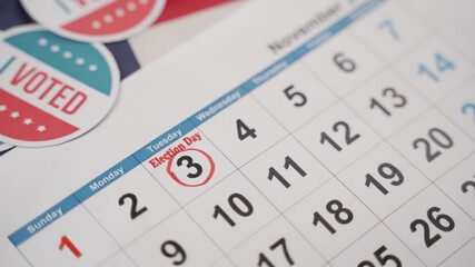 Close up of Hands marking november 3 election day on Calendar as reminder for voting - Concept of reminder for US election