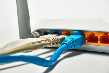 Connecting to a router, network cables connected to a router.