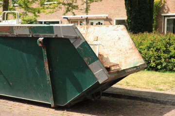 Loaded garbage dumpster