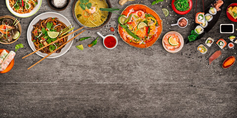 Fototapeta na wymiar Asian food background with various ingredients on rustic stone background , top view. Vietnam or Thai cuisine.