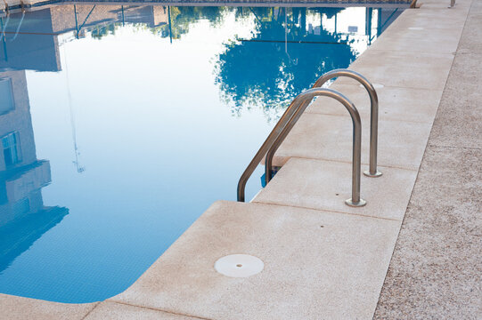 calm pool blue water stair curb